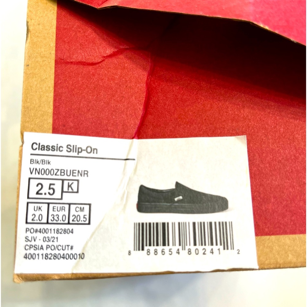 Classic black vans slip on sneakers for kids. Like new Only worn for a few steps